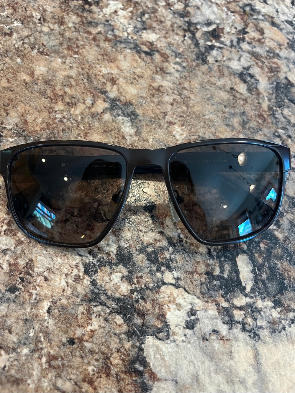 Prada Black Sunglasses with Dark Lenses